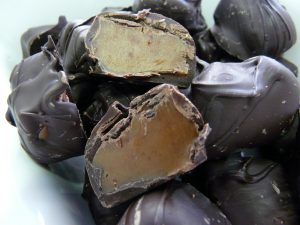 Dark chocolate covered Riley's Toffee Rolls