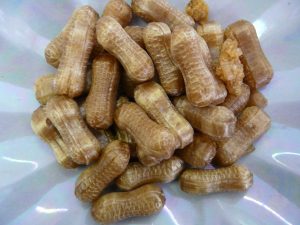 Traditional hard boiled peanut shaped and flavoured sweet
