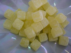 Traditional boiled square sweet with a pineapple taste